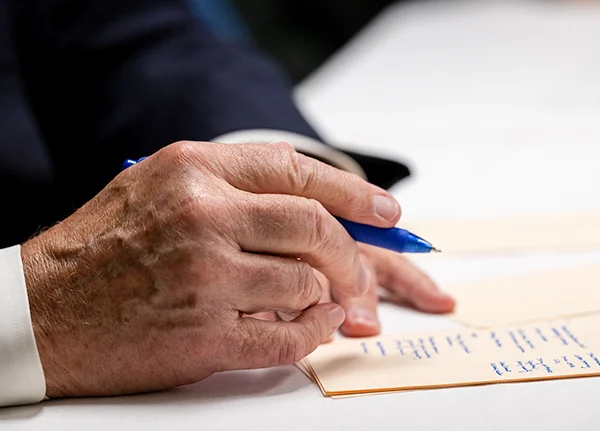 Hand writing on a notecard