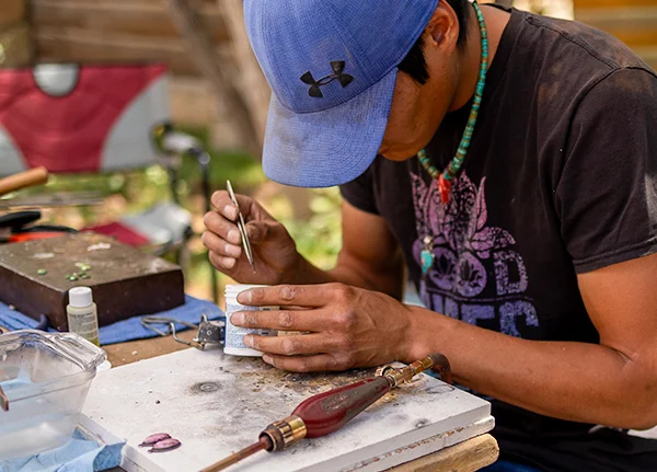 Person making jewelry