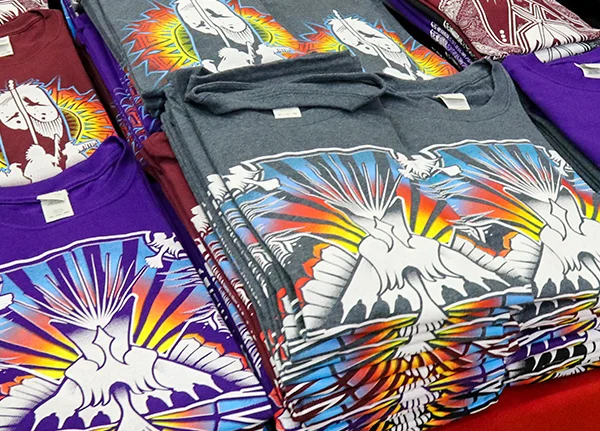 Stack of t-shirts with tribal designs