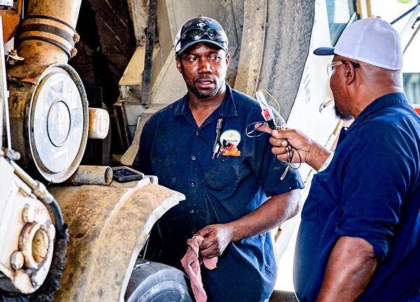 Two mechanics talking