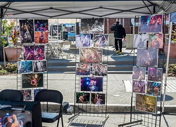 Booth at a street fair selling photographs