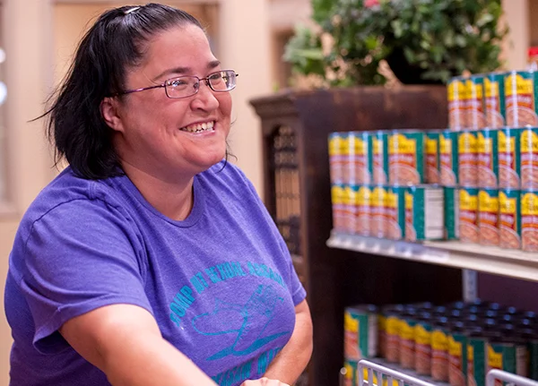 Woman smiling in a grocery store