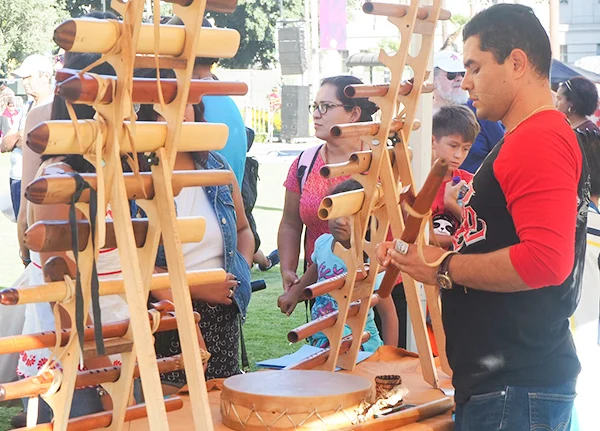 Man selling items at a craft fair