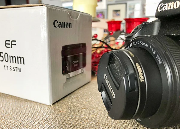 Camera with a lens in a box