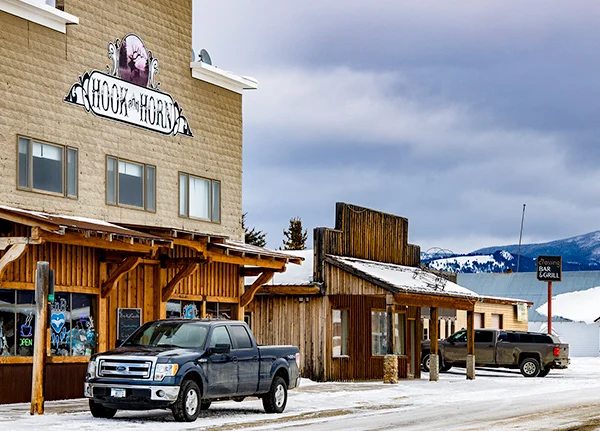 Rural main street with a business called Hook and Horn