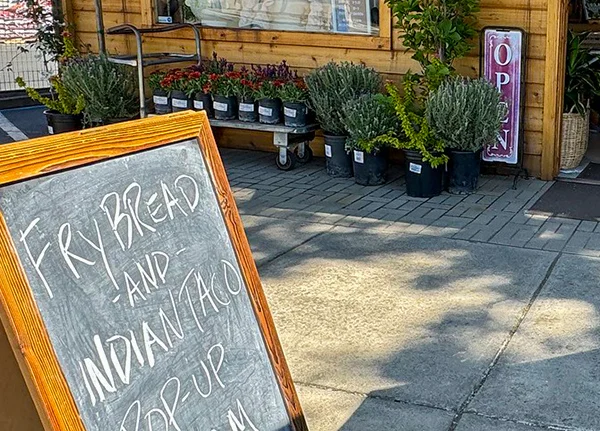 Sign that says Fry Break and Indian Taco Pop-Up in front of a business