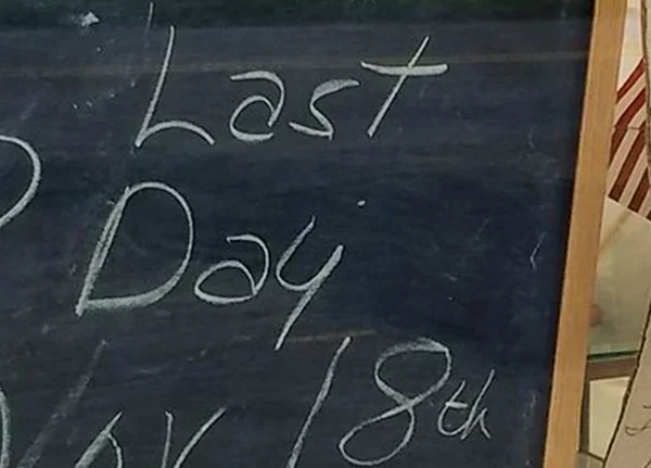 Chalk board with Last Day written on it