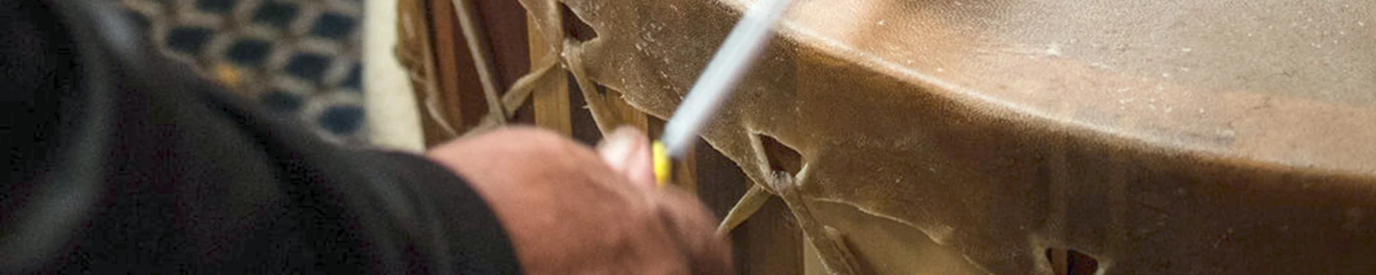 Hand drumming on a traditional drum