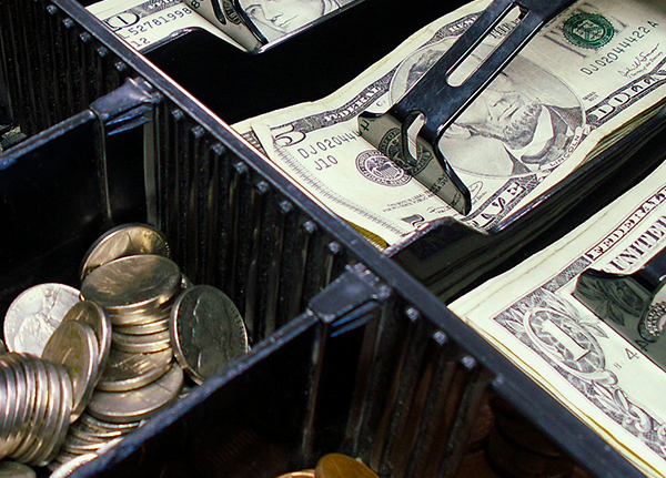 Cash and coins in a cash register
