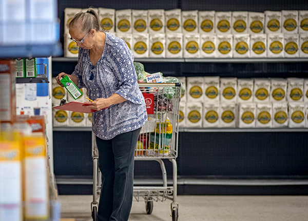 Woman shopping at a food co-op