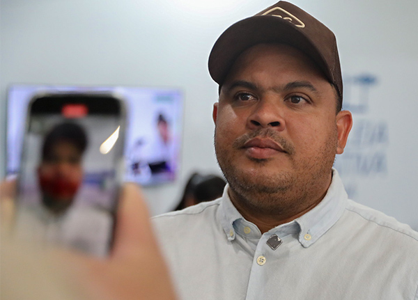 Man being filmed on a phone