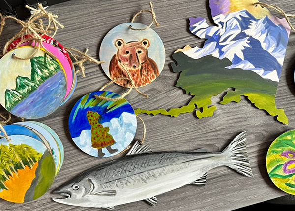 Hand-painted ornaments with animals and nature scenes