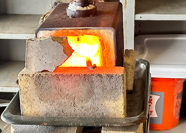 A metal forge burning hot