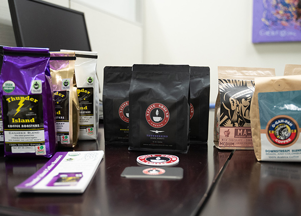 Bags of coffee with tribal branding