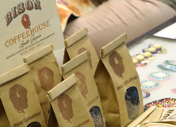 Bags of coffee with a logo that says Bison Coffeehouse