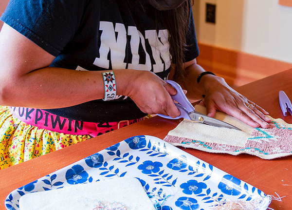 Person cutting fabric