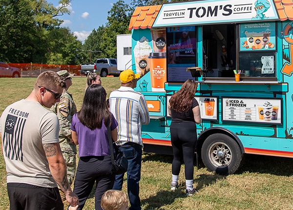 A small line of people at a food truck