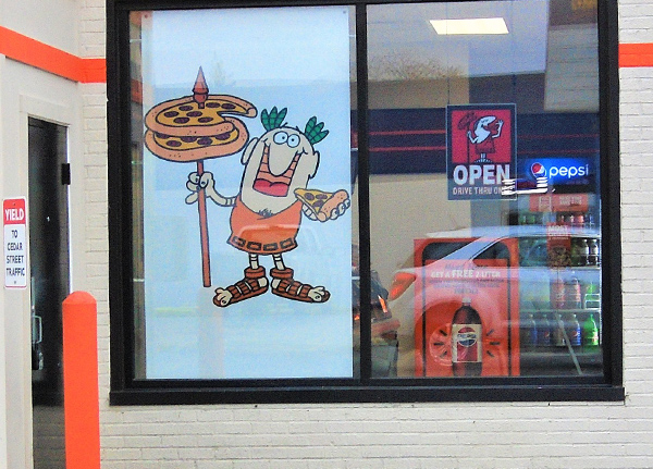 Window of a Little Caesars Pizza store