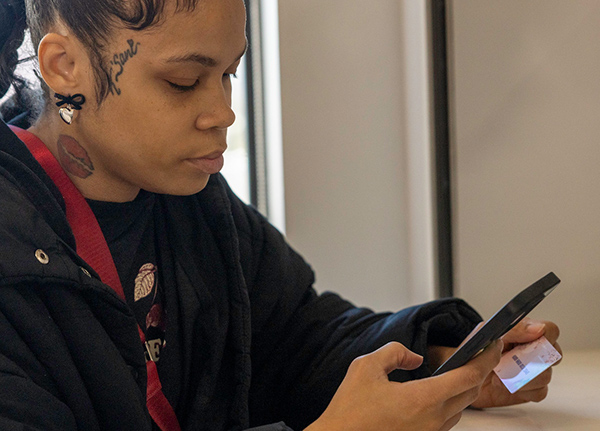 Woman looking at something on her phone