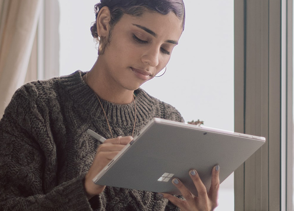 Woman using tablet computer