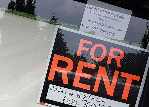 For Rent sign in a window