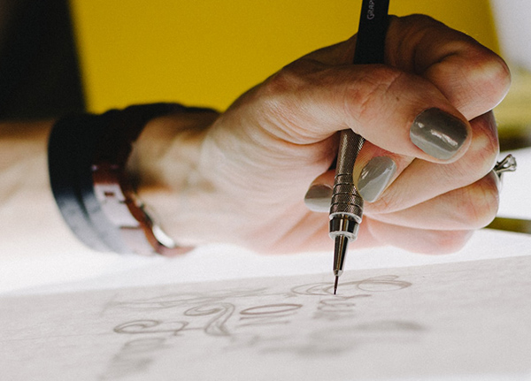 Hand sketching a logo