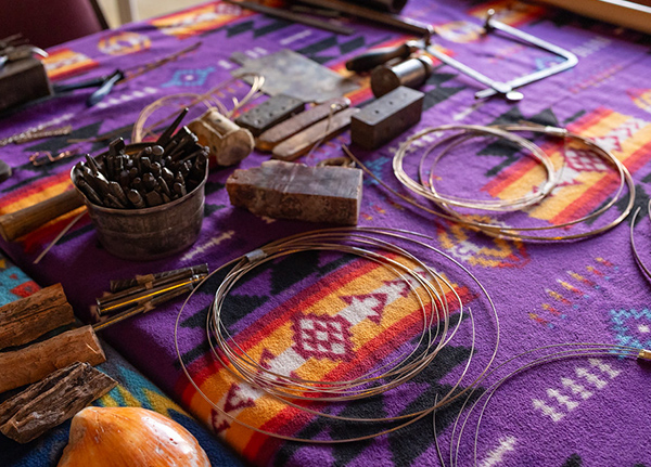 Wire and jewelry-making supplies on a table