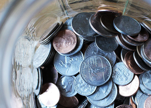 Coins in a glass jar