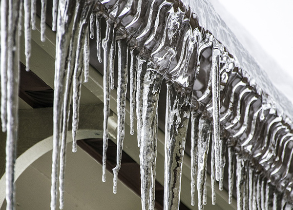 Icicles hanging from a gutter