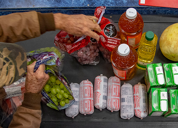 Groceries on a checkout conveyor belt