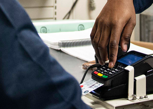 Card inserted into a sales system machine